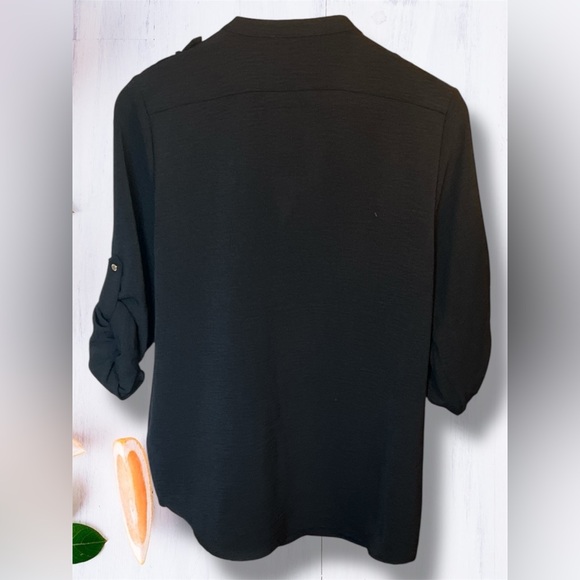 Calvin Klein Black Button Down Shirt with gold button accents. - Picture 2 of 6